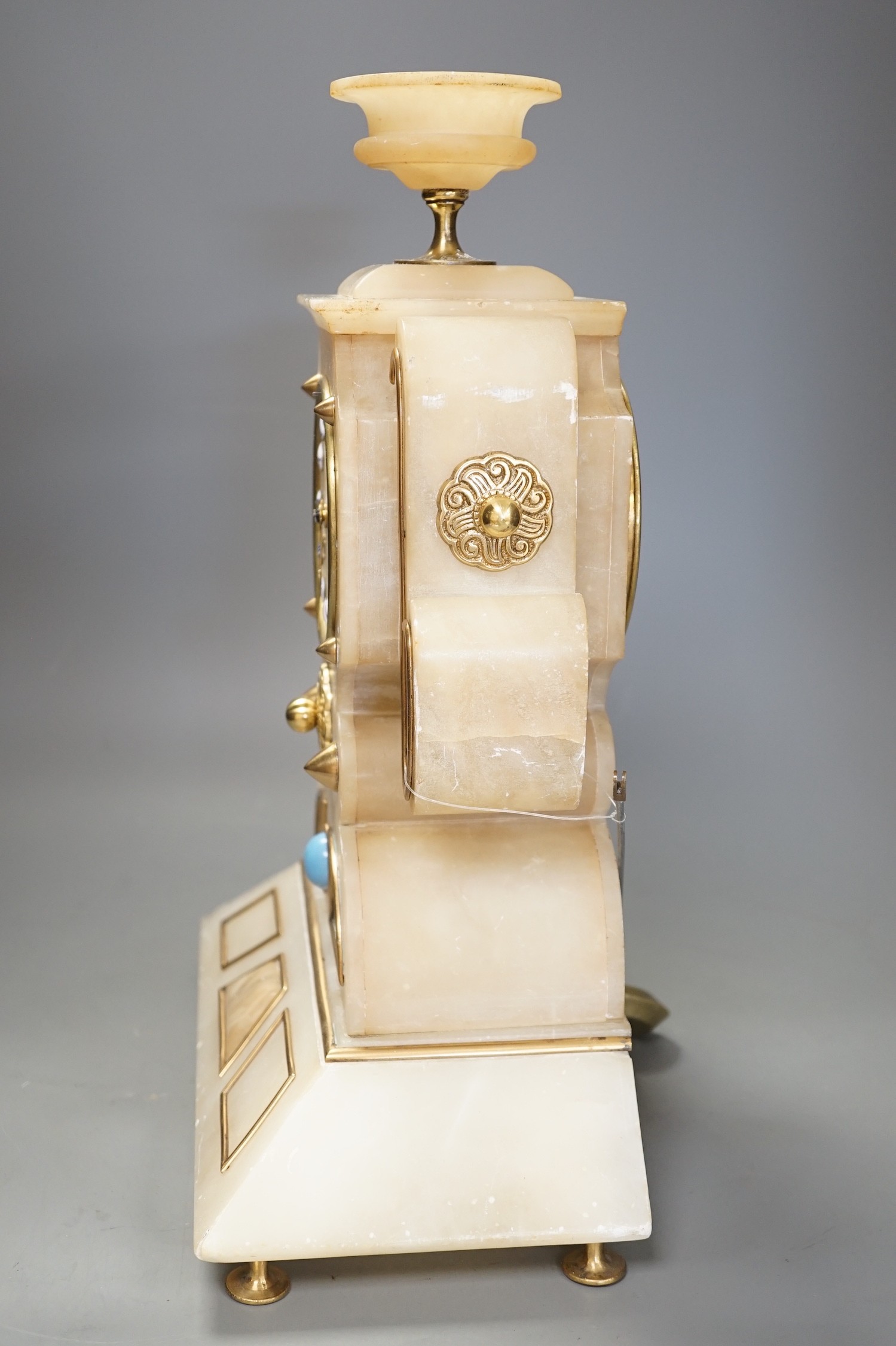 A French Art-Deco style alabaster mantel clock, 39cm tall